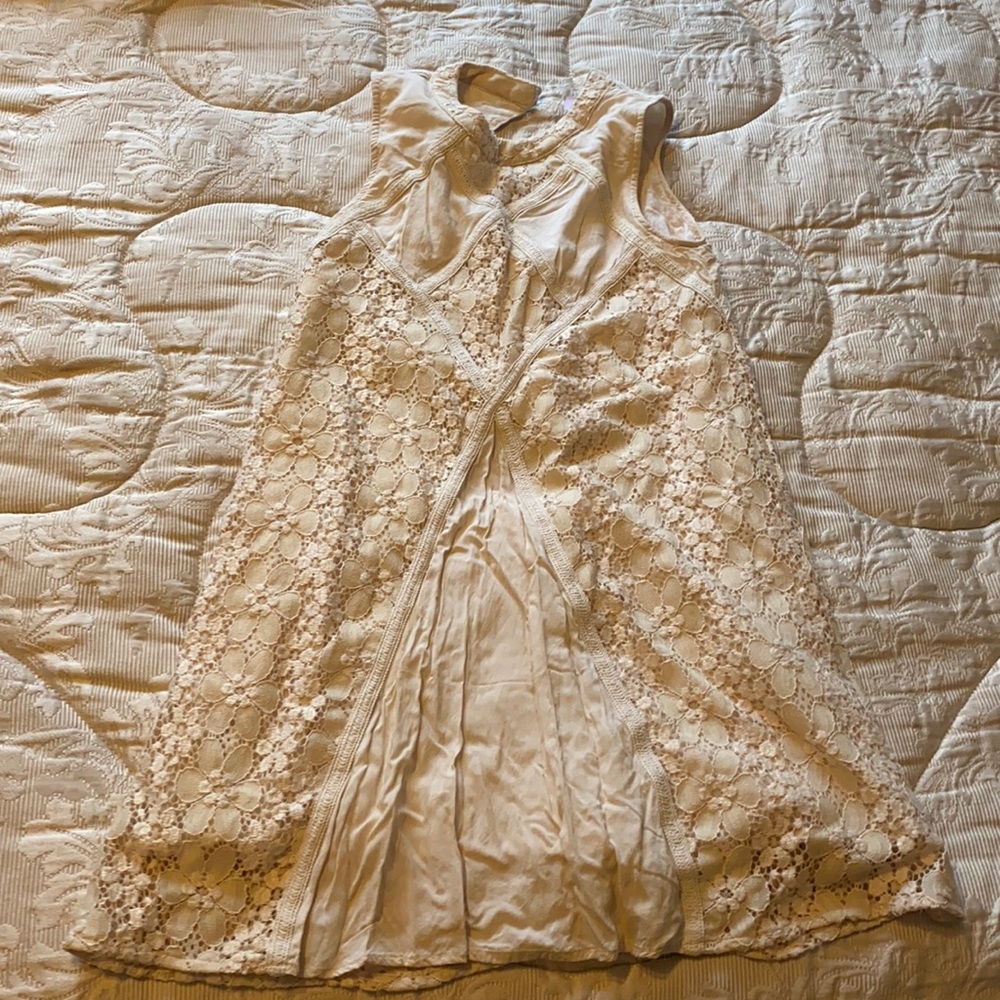Gently worn cream lacy dress